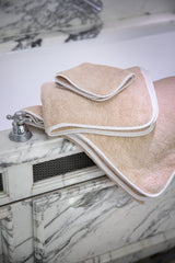 Beige napkin with piping
